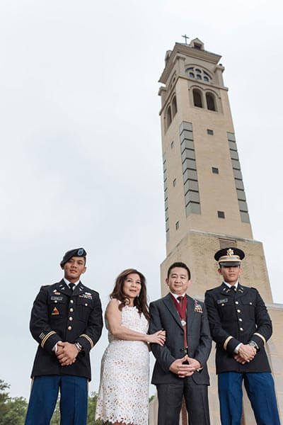 From left, Capt. Jules Chan (B.B.A. '08), his mother Vanessa (M.A. '98), father Julius and younger brother Jed Chan (B.A. '15).
