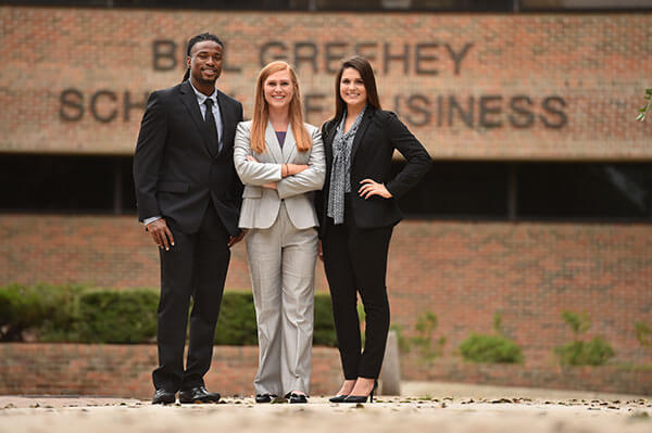 Greehey Scholars outside of Alkek Business Building