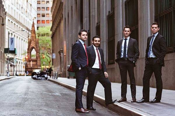 From left, Rick Diaz (B.B.A. '09), Albert Cruz (B.B.A. '06), Matt Sisneros (B.B.A. '12), and Alfonso Diaz (B.B.A. '07)