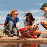Evelynn Mitchell, Ph.D., instructs students at Enchanted Rock.