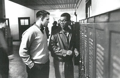 Louis Cousins at Maury talking to a fellow student.