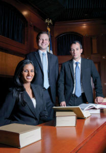 Three students in courtroom