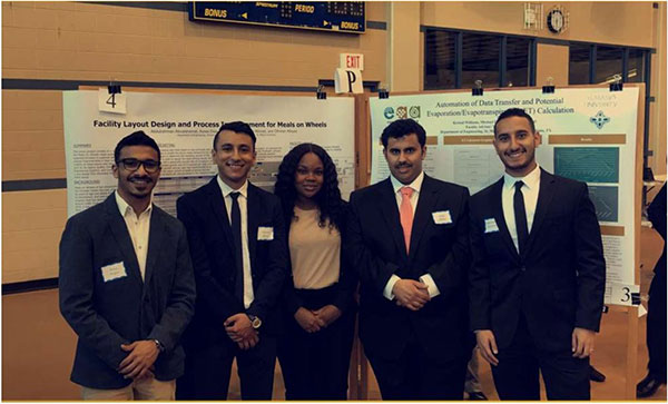 Jassim Albinali with a group.