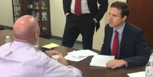 Then-law student Billy Calve (Class of 2017) consults with attorney Gary Howell (Class of 2015) at an Ask-A-Lawyer event hosted by Caritas Legal Services, the legal services division of Catholic Charities of the Archdiocese of San Antonio.