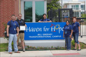 Students and staff at Haven for Hope, where the Center for Legal and Social Justice serves as a partner, providing legal services, identification recovery assistance, and warrant relief clinics.