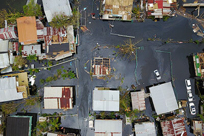 Floodwaters overwhelm the neighborhood of Juana Matos in Cataño, Puerto Rico, after Hurricane Maria inundated the island in September.