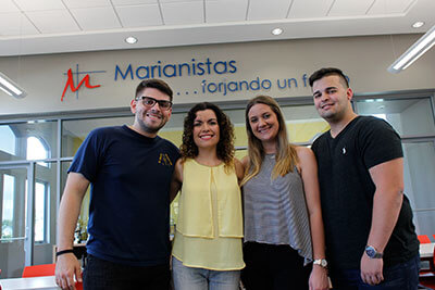 St. Mary’s students Mei-Ling Camacho Acevedo, David Pagán, Paola Díaz Portela and Andrés Palacios meet over Christmas break inside Colegio San José.
